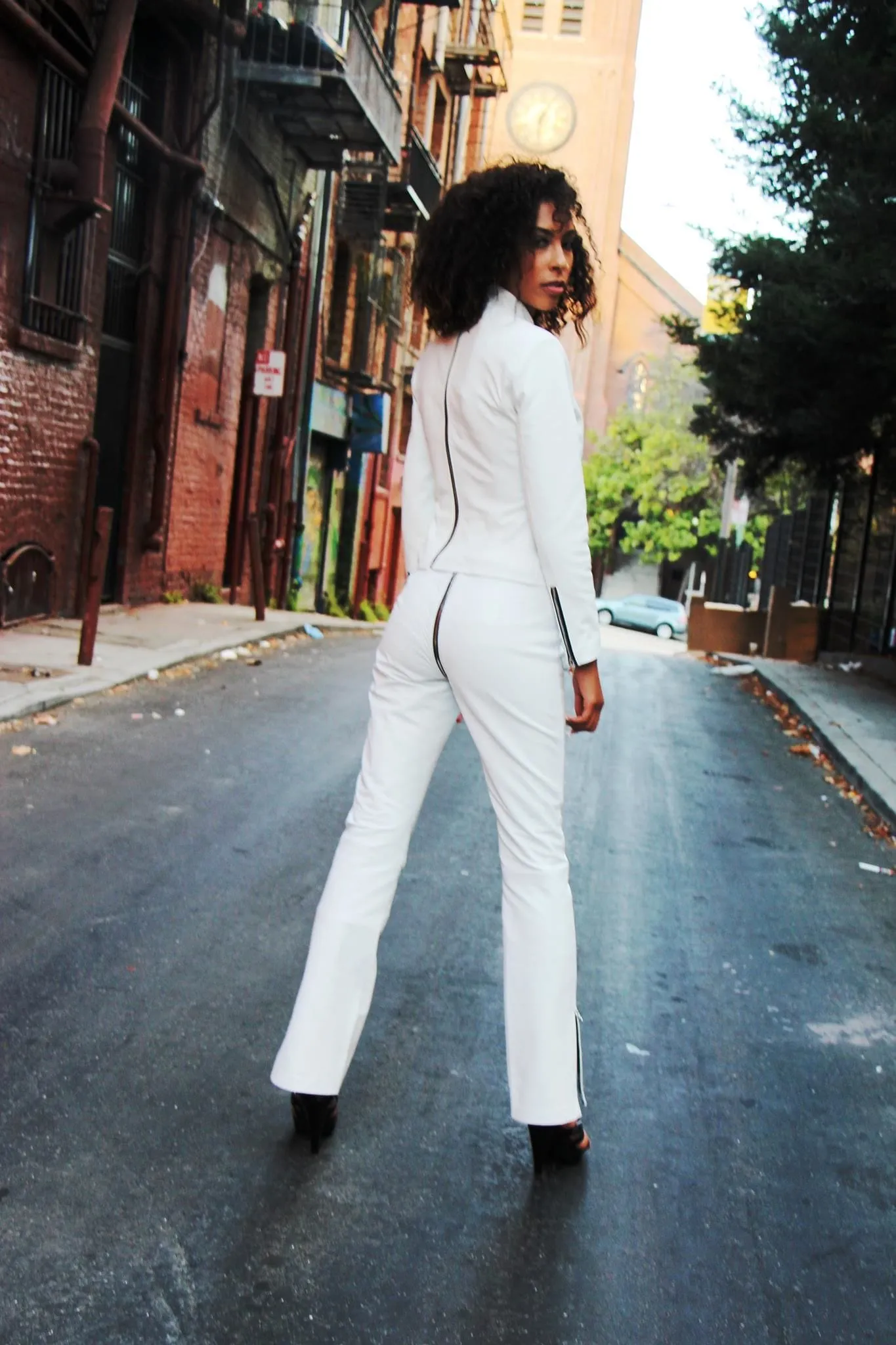 Legs for Days  with our White Leather Pants that we make for the film industry